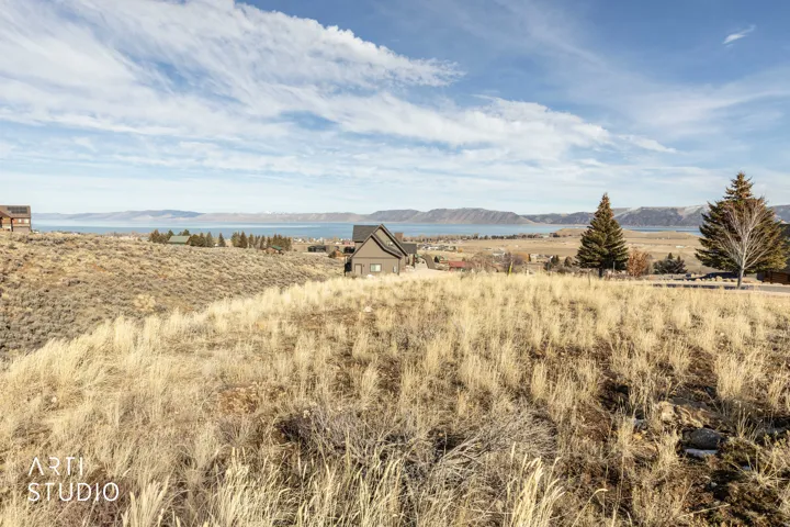 View of mountain backdrop featuring rural landscape