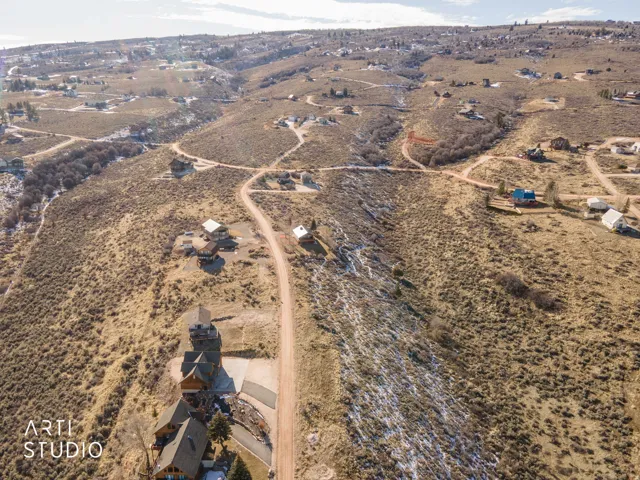 Aerial view of property and surrounding area with rural landscape