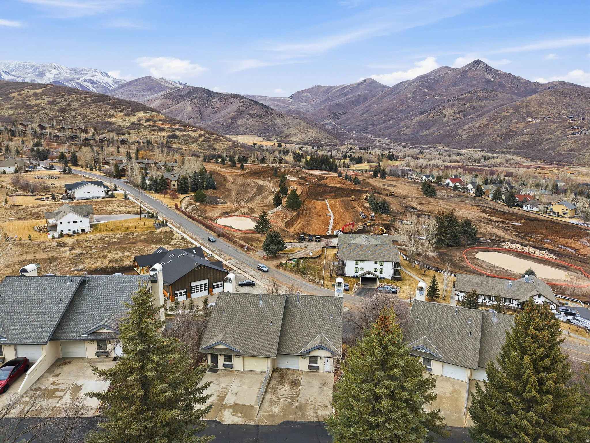 Aerial perspective of suburban area with mountains