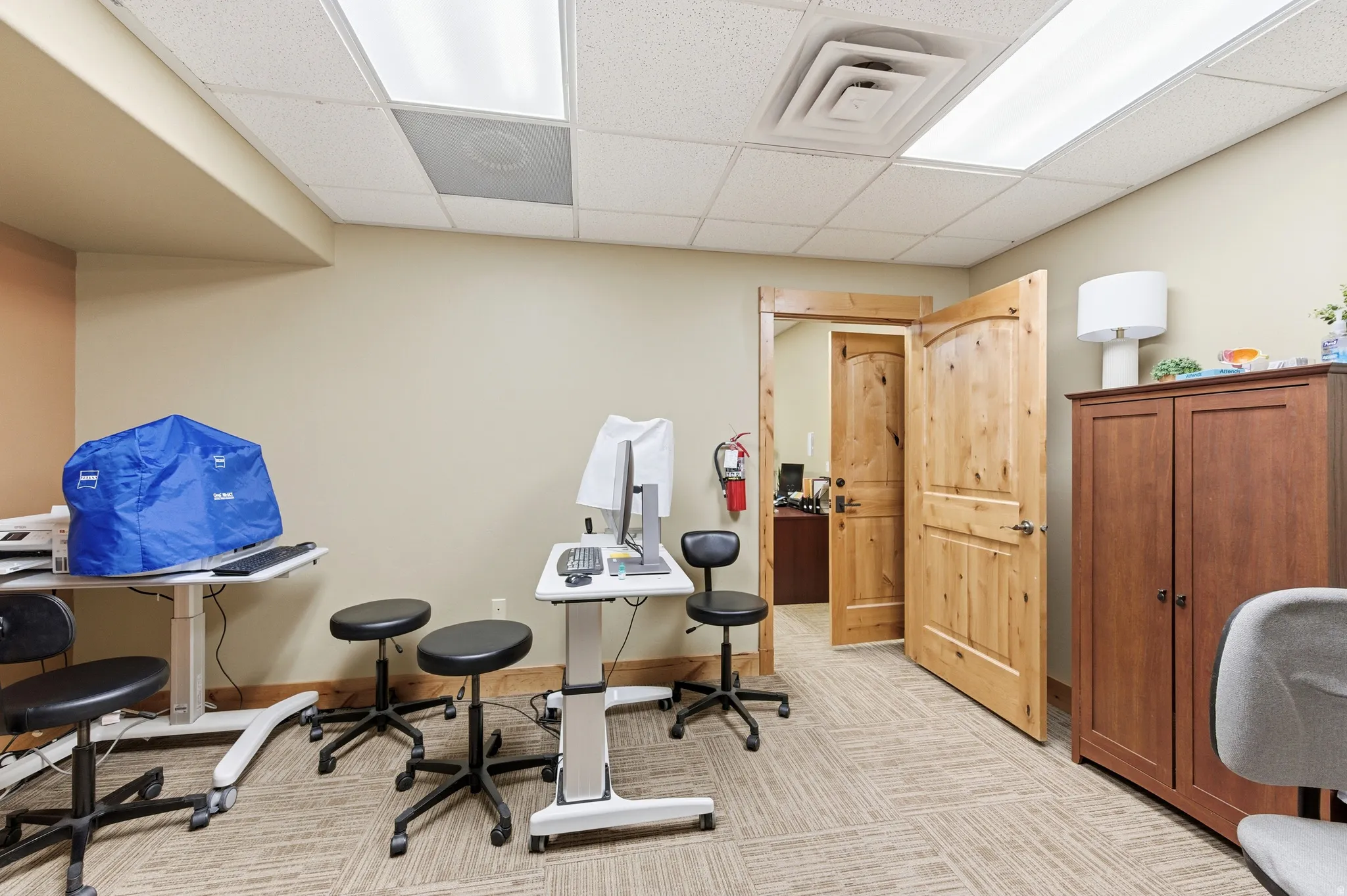 Office space featuring a paneled ceiling