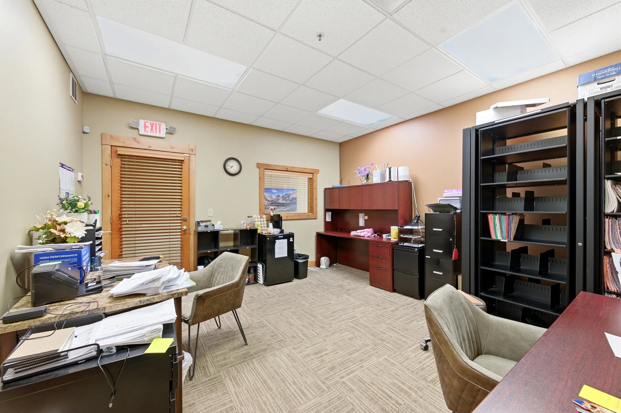 Office area featuring a paneled ceiling