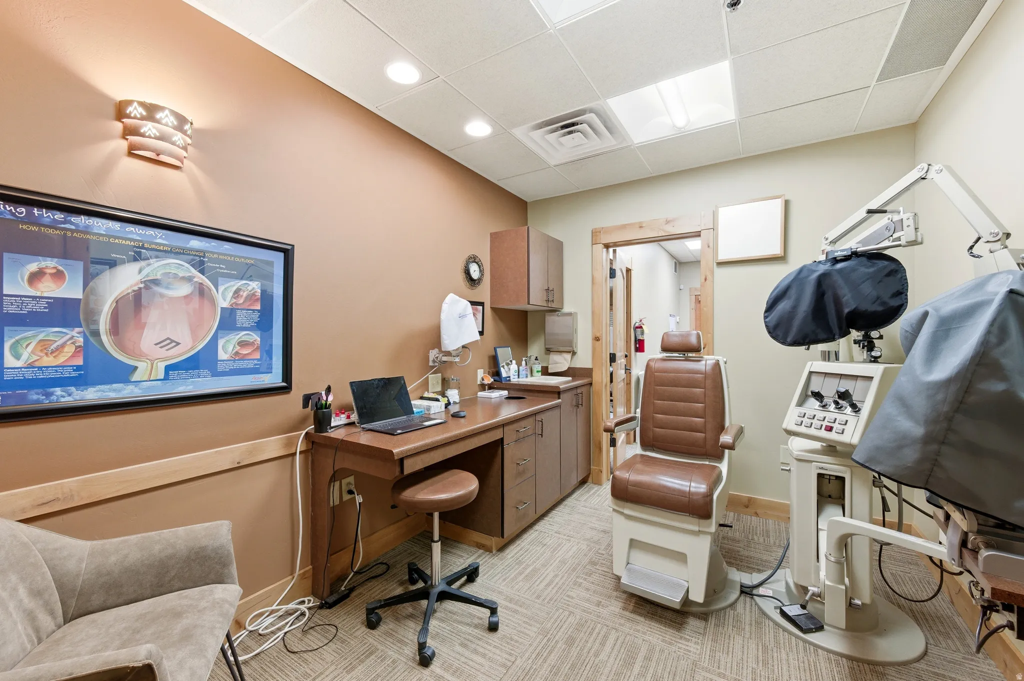 Home office featuring a drop ceiling