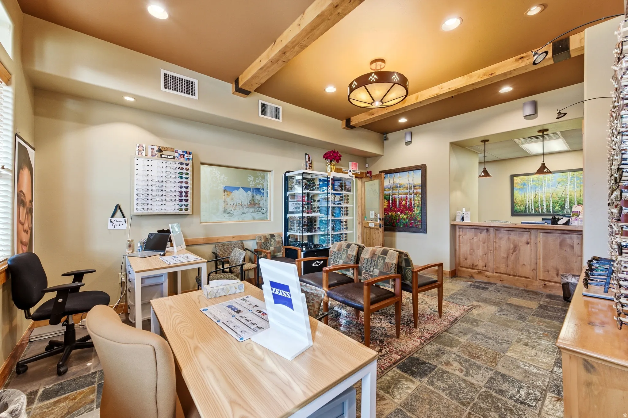 Office area with recessed lighting and beam ceiling
