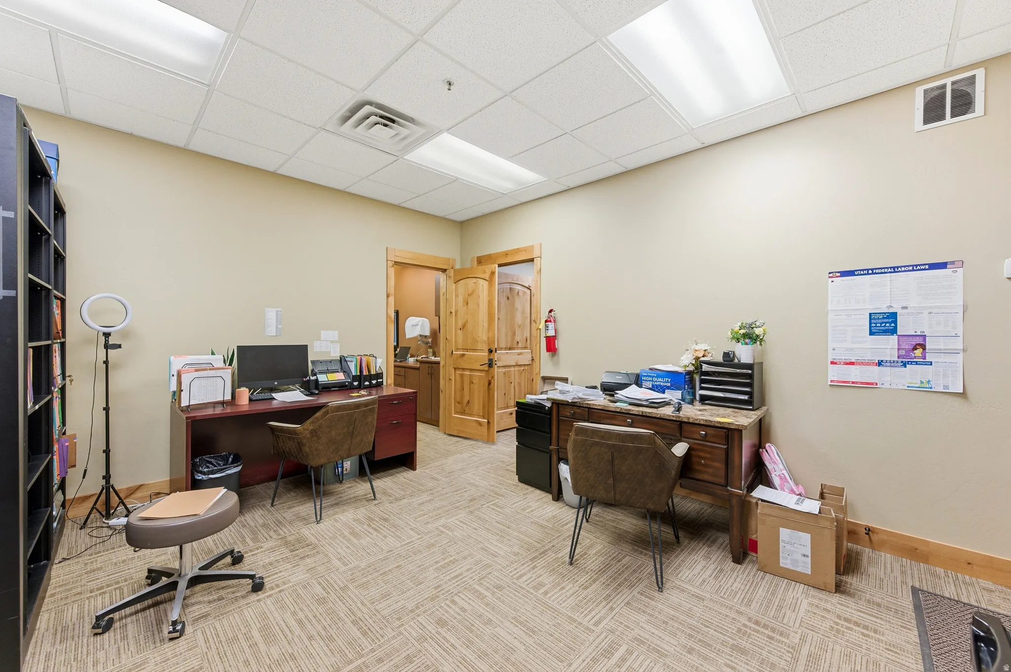 Office space featuring a paneled ceiling