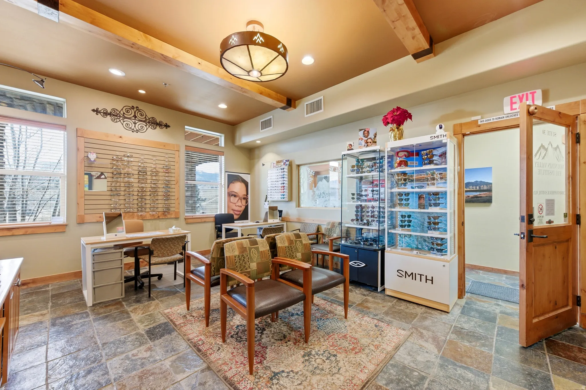 Office area with recessed lighting and beam ceiling