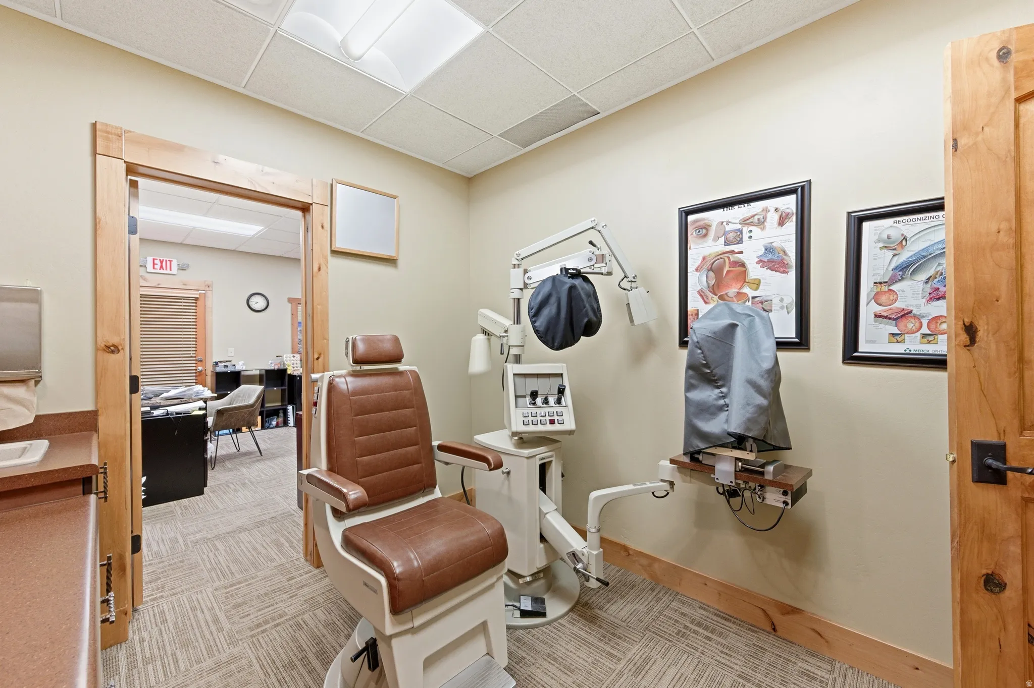 Living area featuring a paneled ceiling