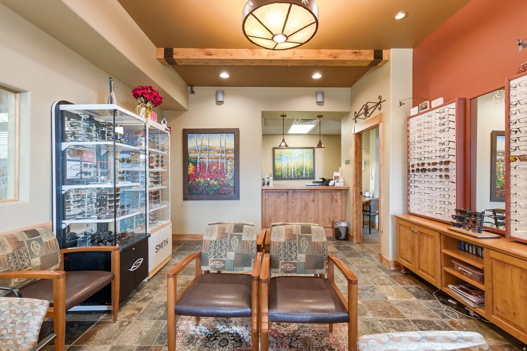 Dining space with recessed lighting, stone finish floors, and beamed ceiling