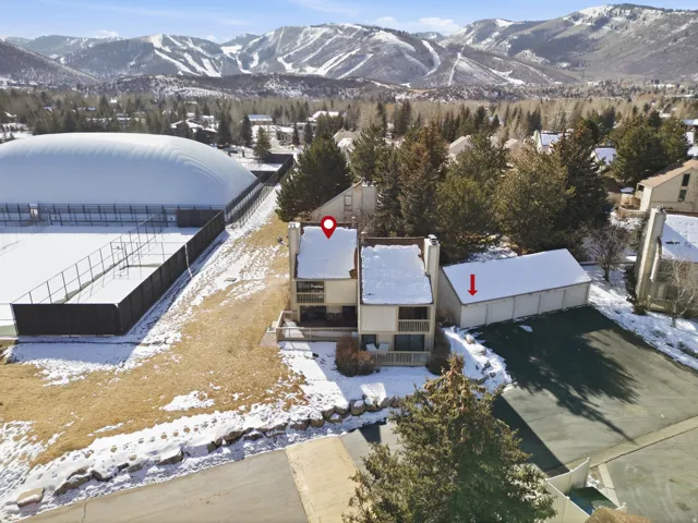 Snowy aerial view with a mountain view
