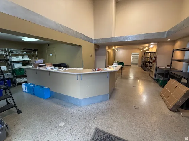 Reception area featuring a high ceiling
