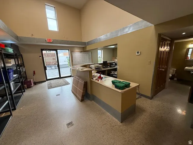 Reception featuring a high ceiling