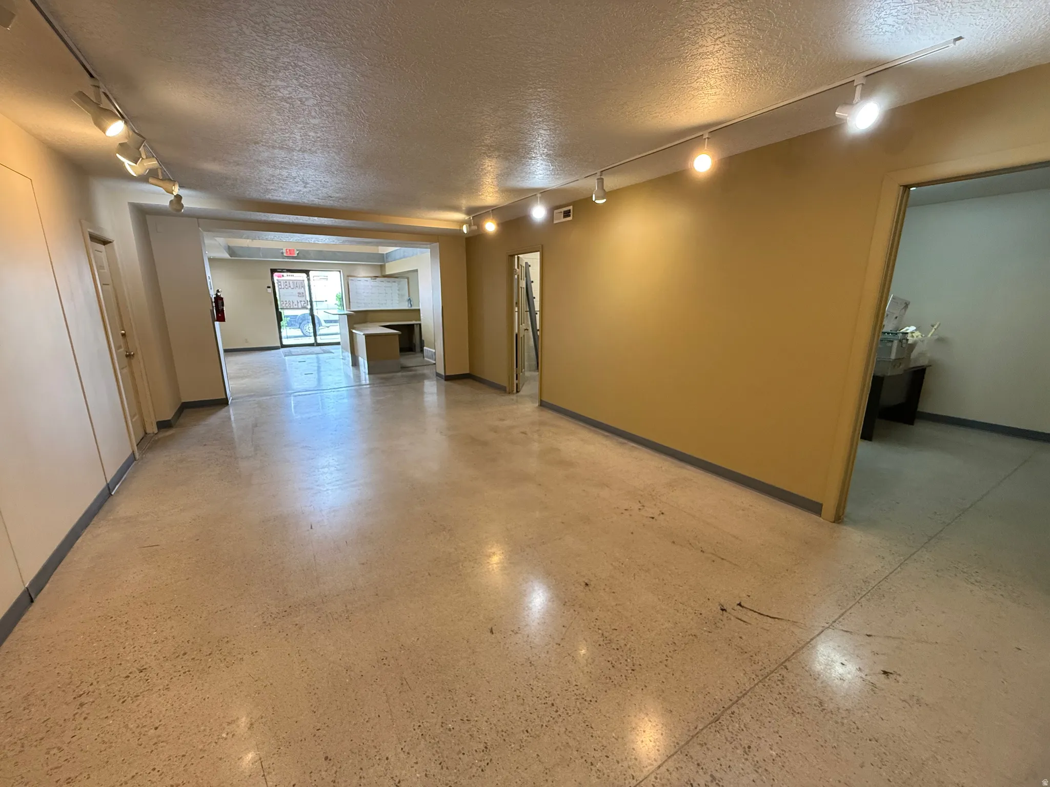 Office, Showroom with track lighting.