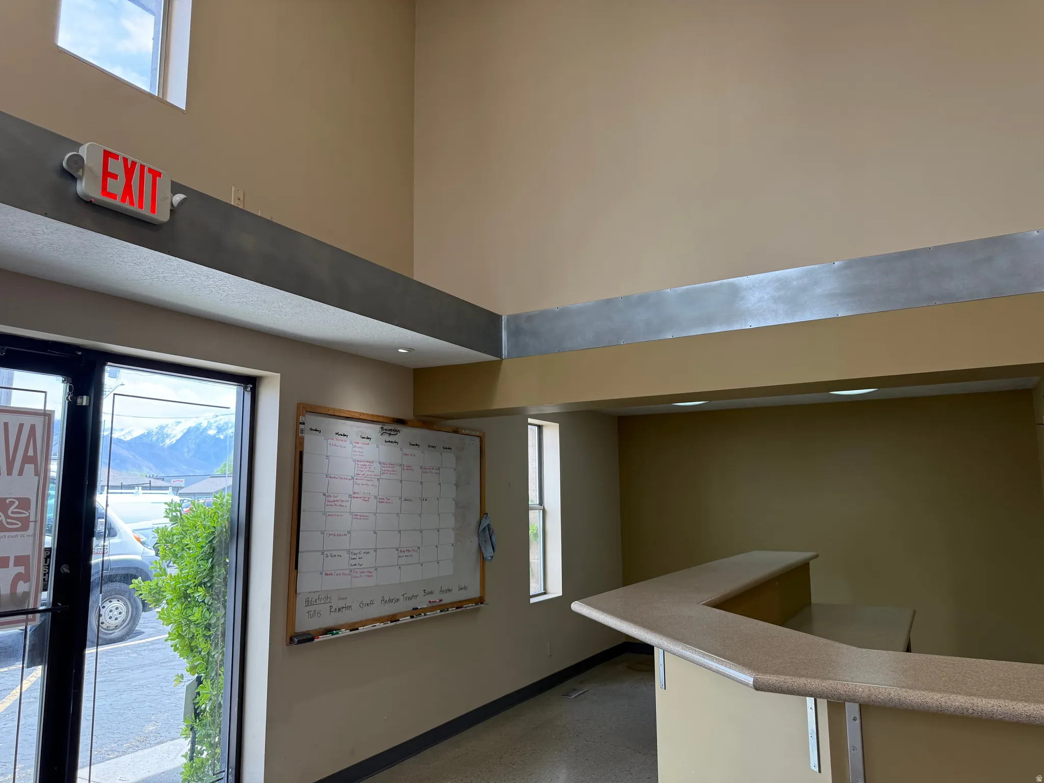 Interior space featuring high ceiling