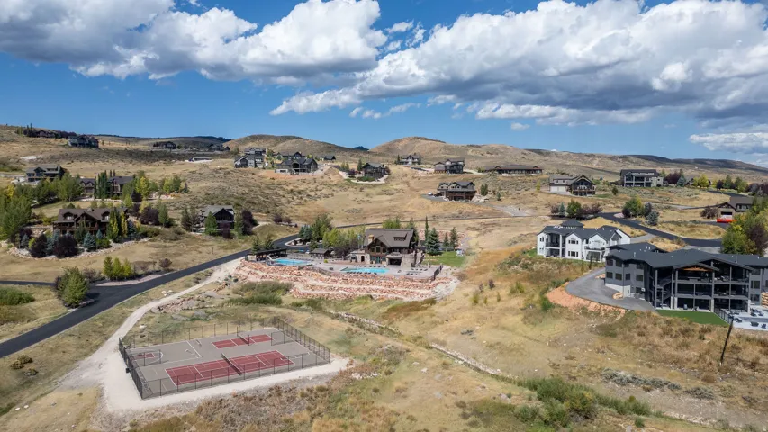 View of property location featuring nearby suburban area and mountains