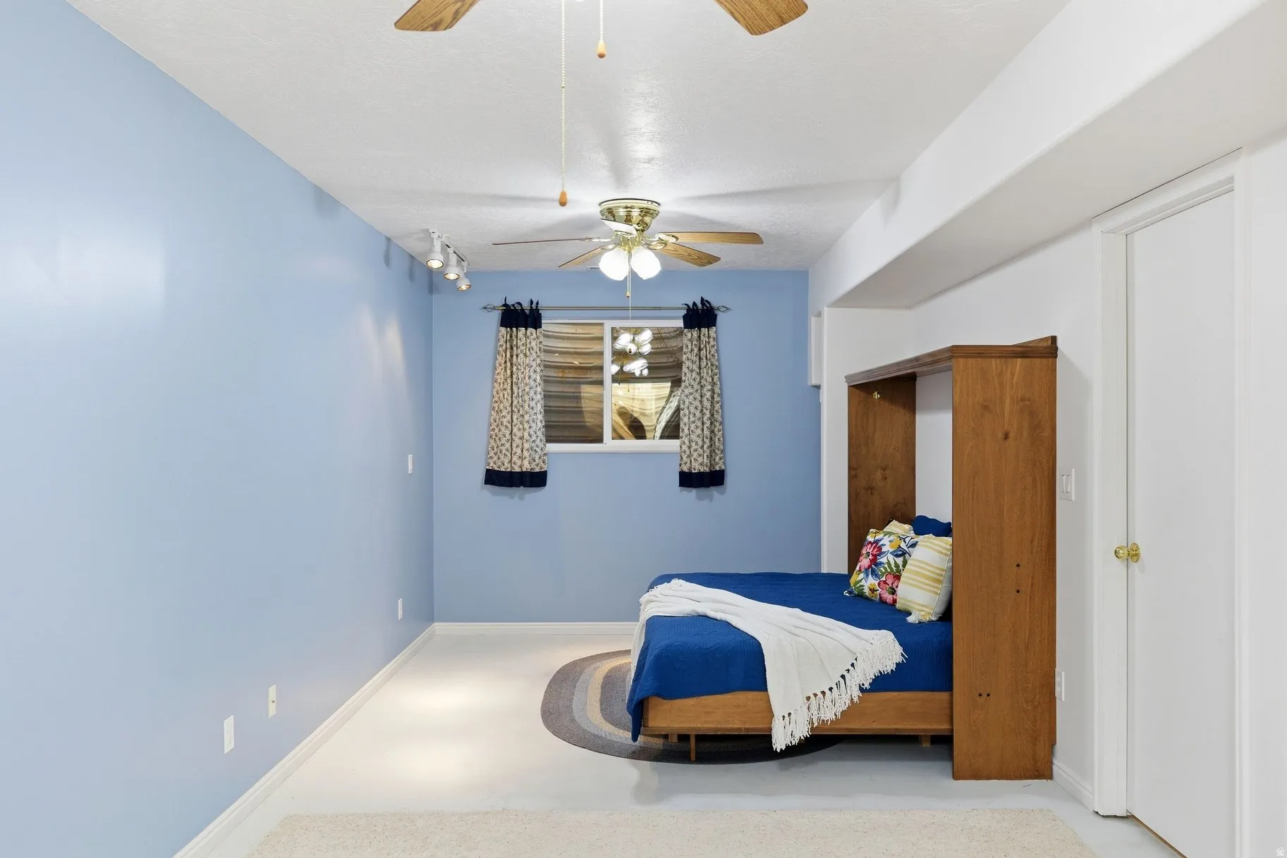 Bedroom with a ceiling fan