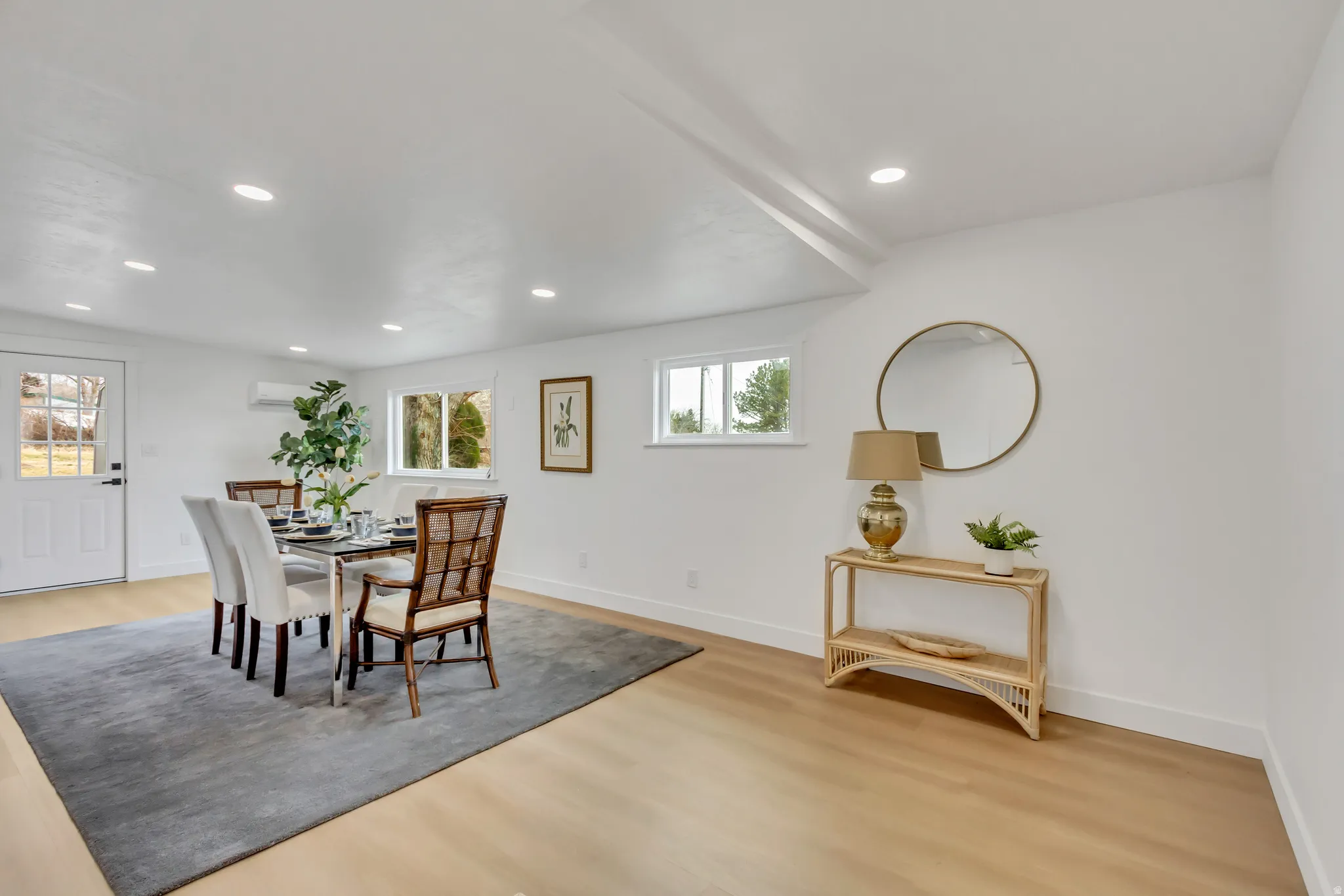 Dining space featuring light wood-type flooring and recessed lighting