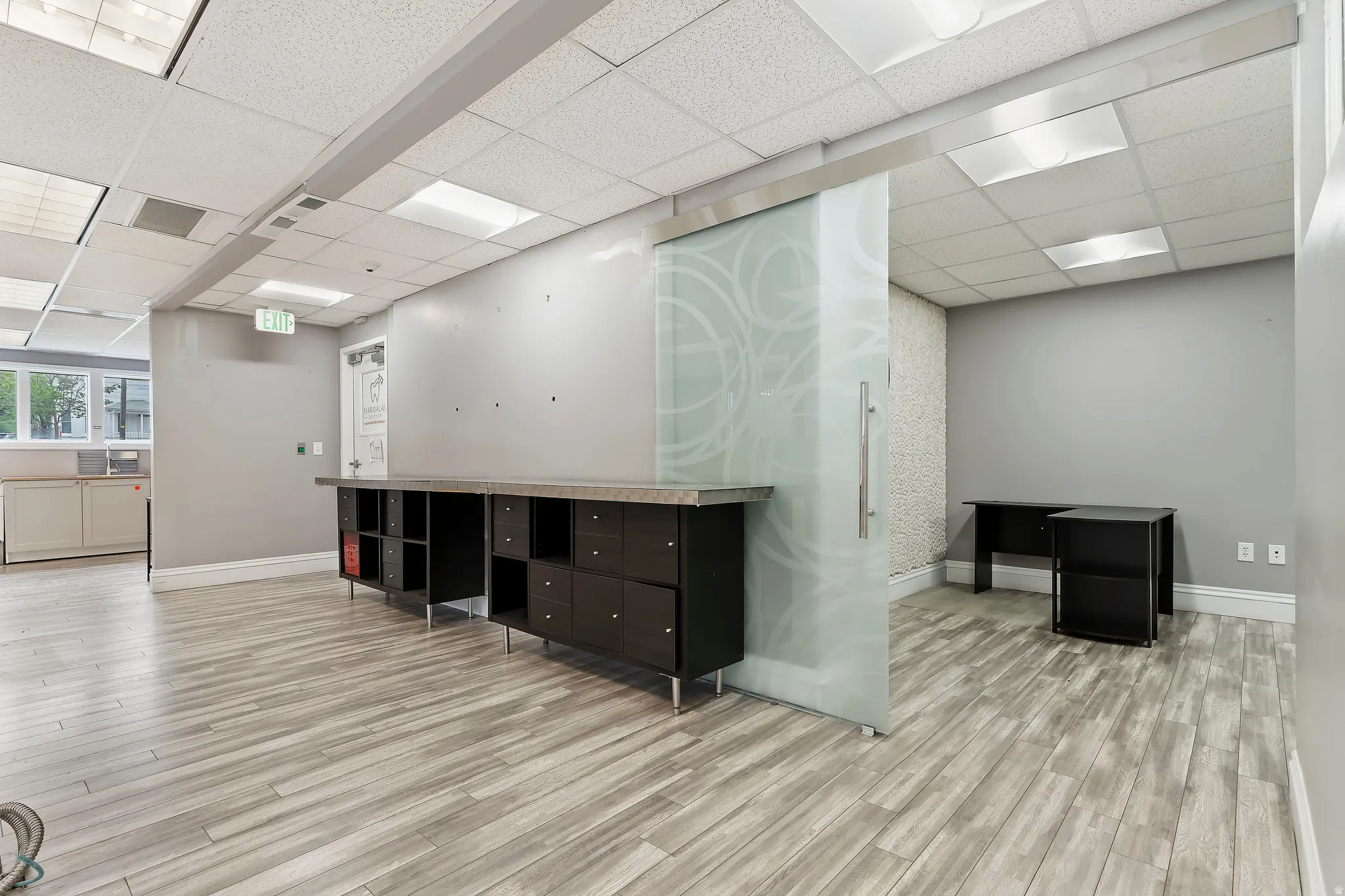 Unfurnished office with a drop ceiling