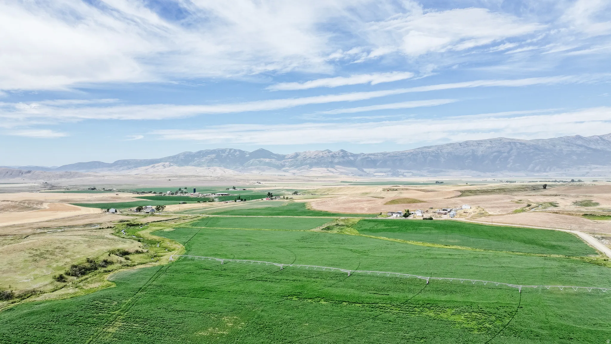 Surrounding community featuring a mountain view and a view of countryside