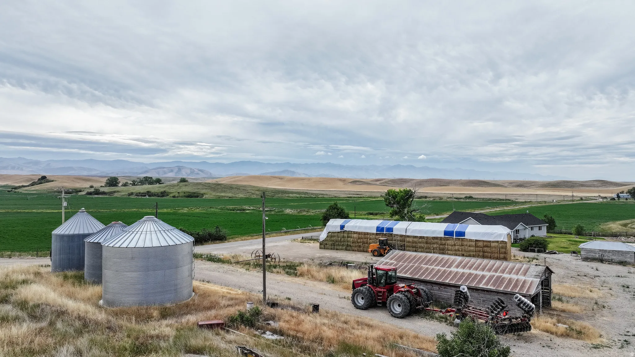 Aerial view of sparsely populated area featuring a mountainous background