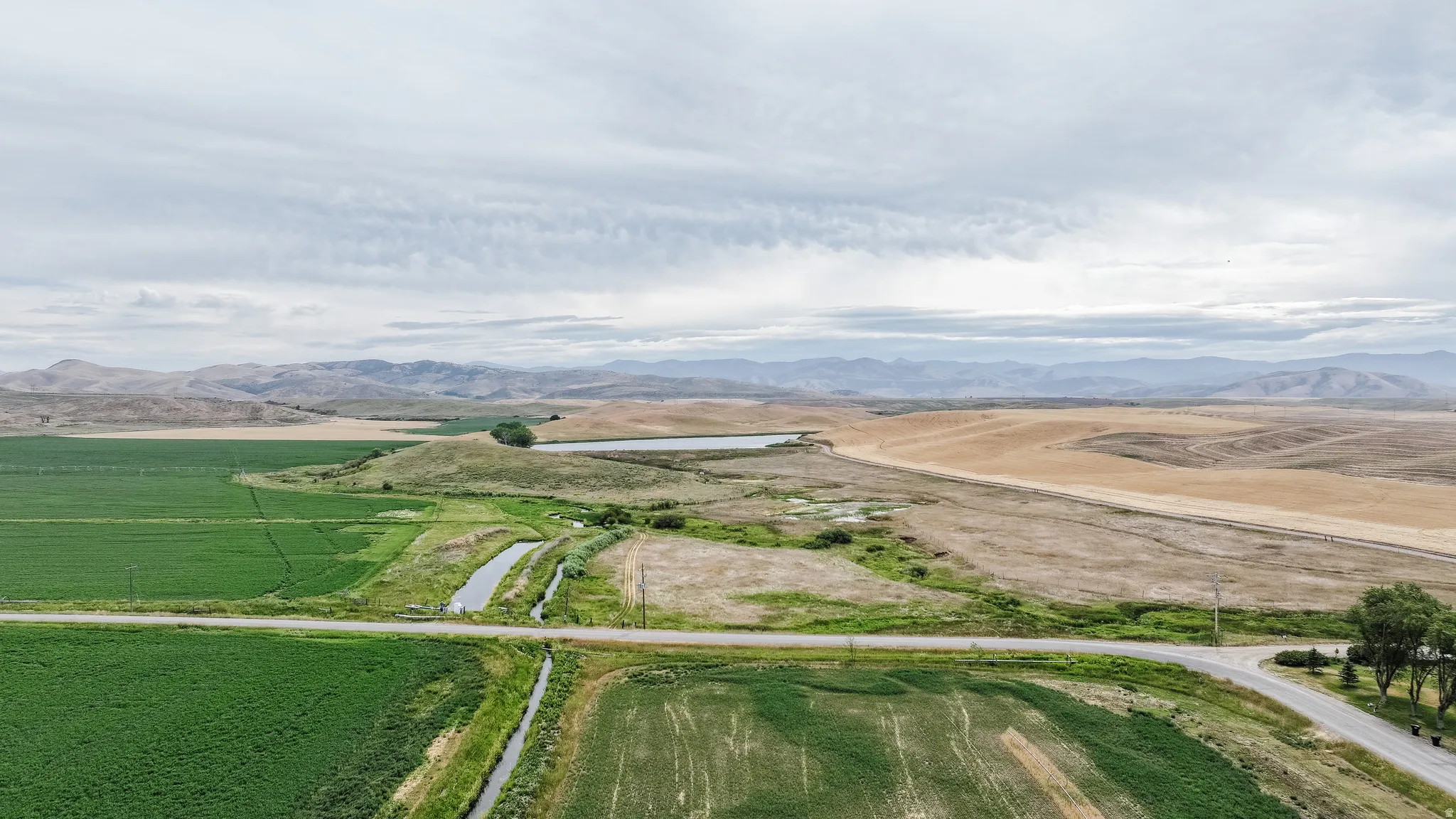View of rural area with a water and mountain view