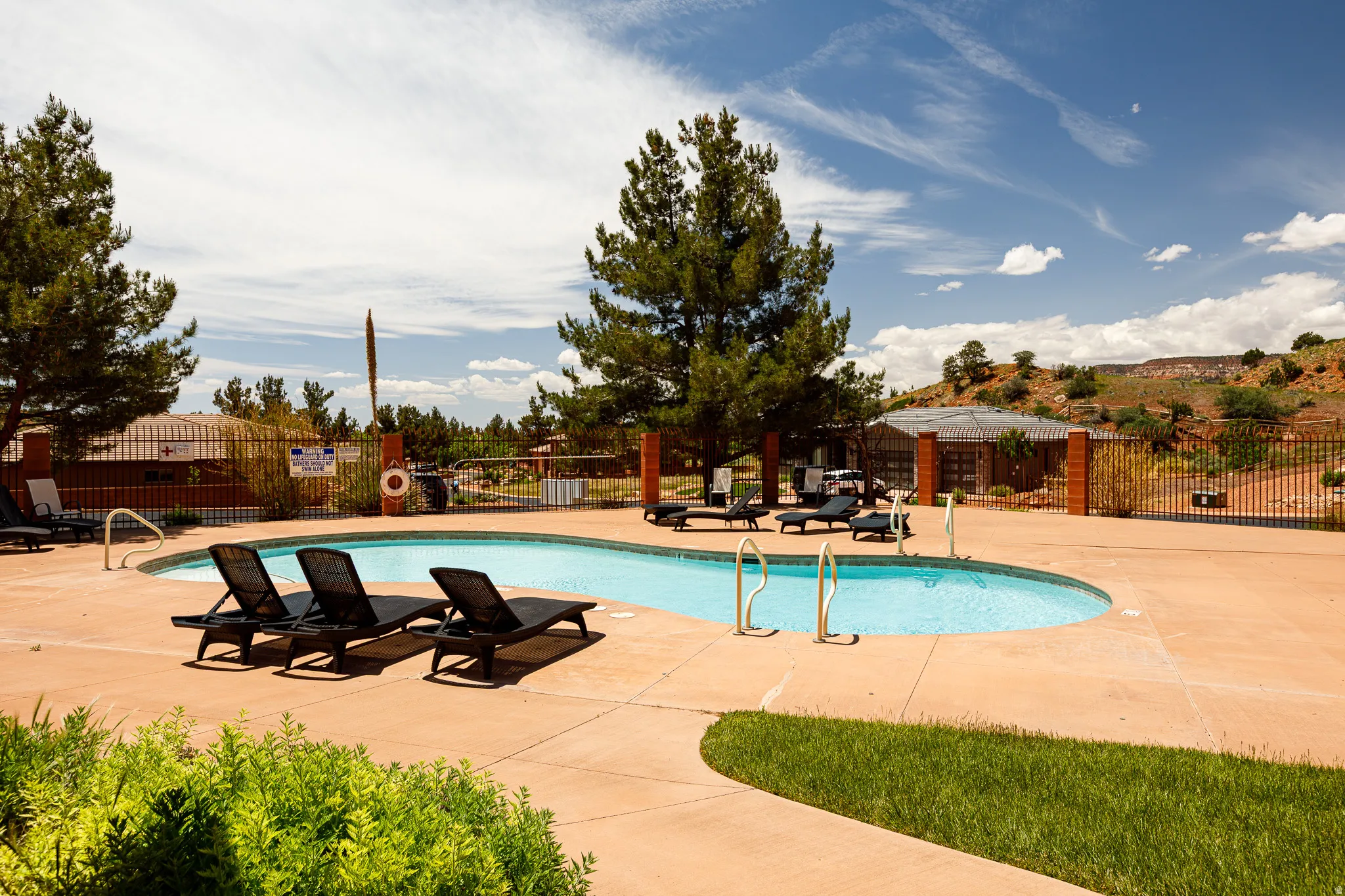 Community pool with a patio area