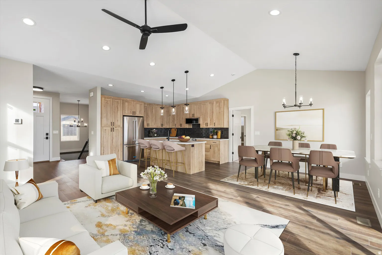 Living room with a chandelier, a ceiling fan, dark wood finished floors, and lofted ceiling