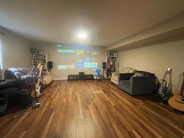 Living room with wood finished floors and baseboards