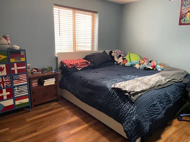Bedroom featuring wood finished floors