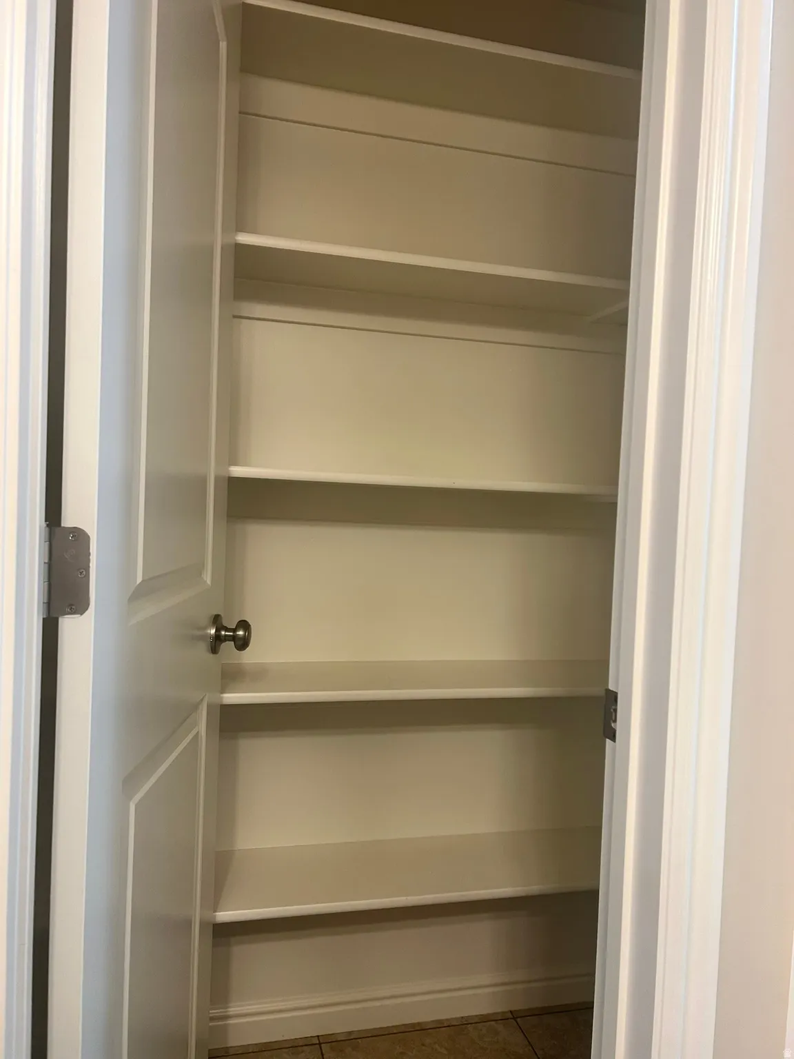 Large linen closet in basement Bathroom.