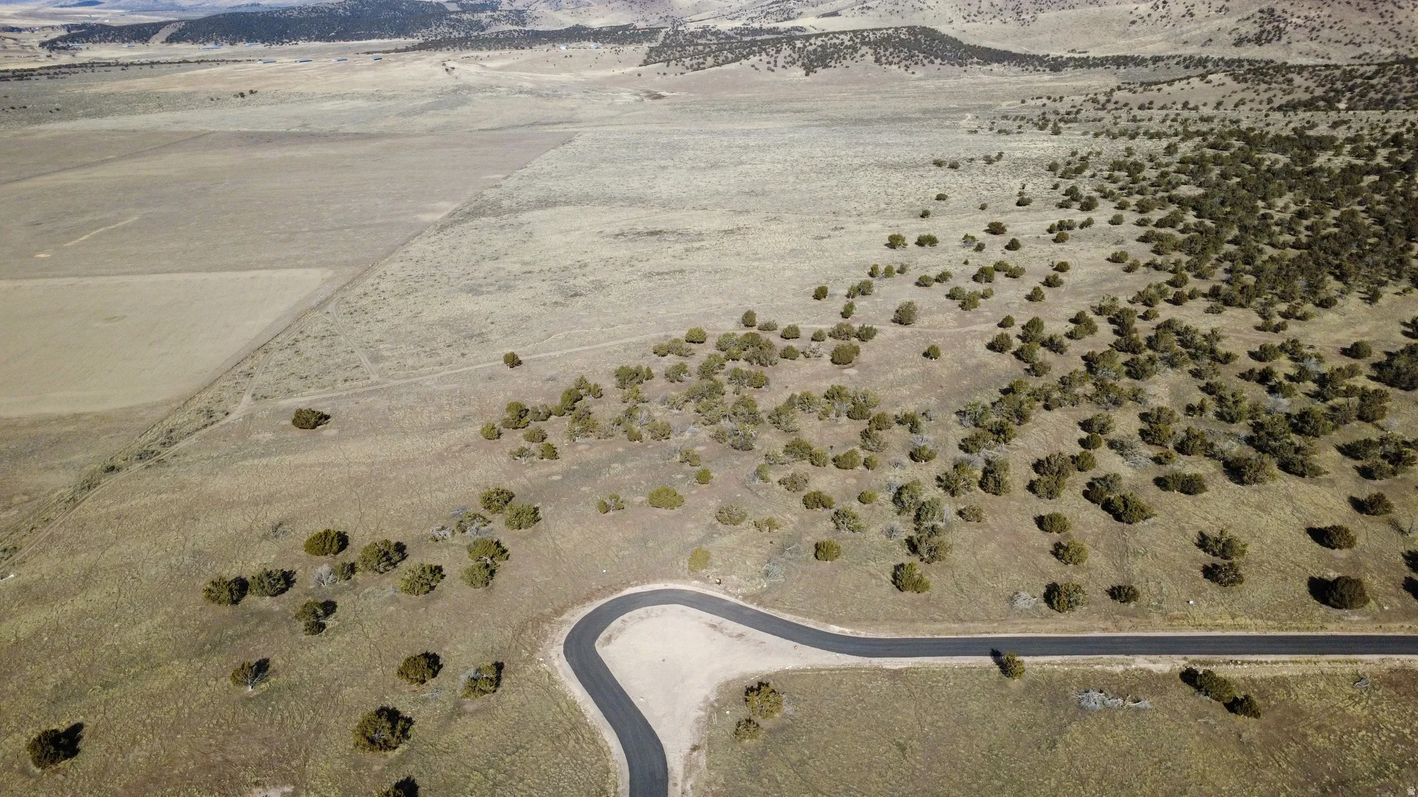 View of property location with rural landscape and a mountainous background