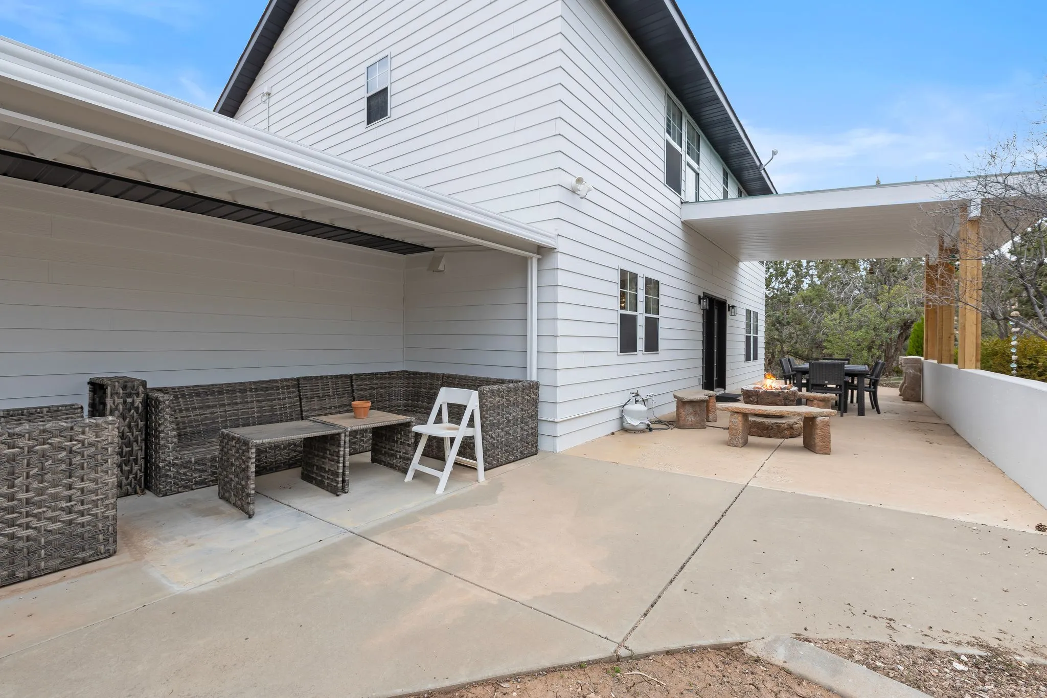 View of patio / terrace with a fire pit and outdoor lounge area