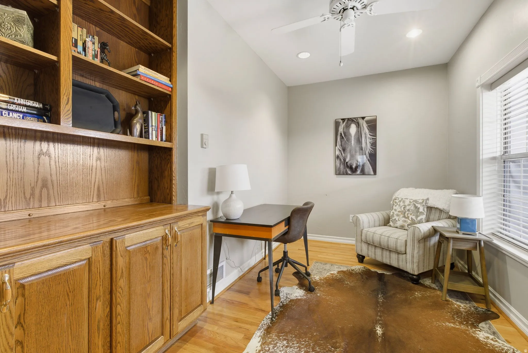 Office space with light wood-style floors, recessed lighting, and a ceiling fan