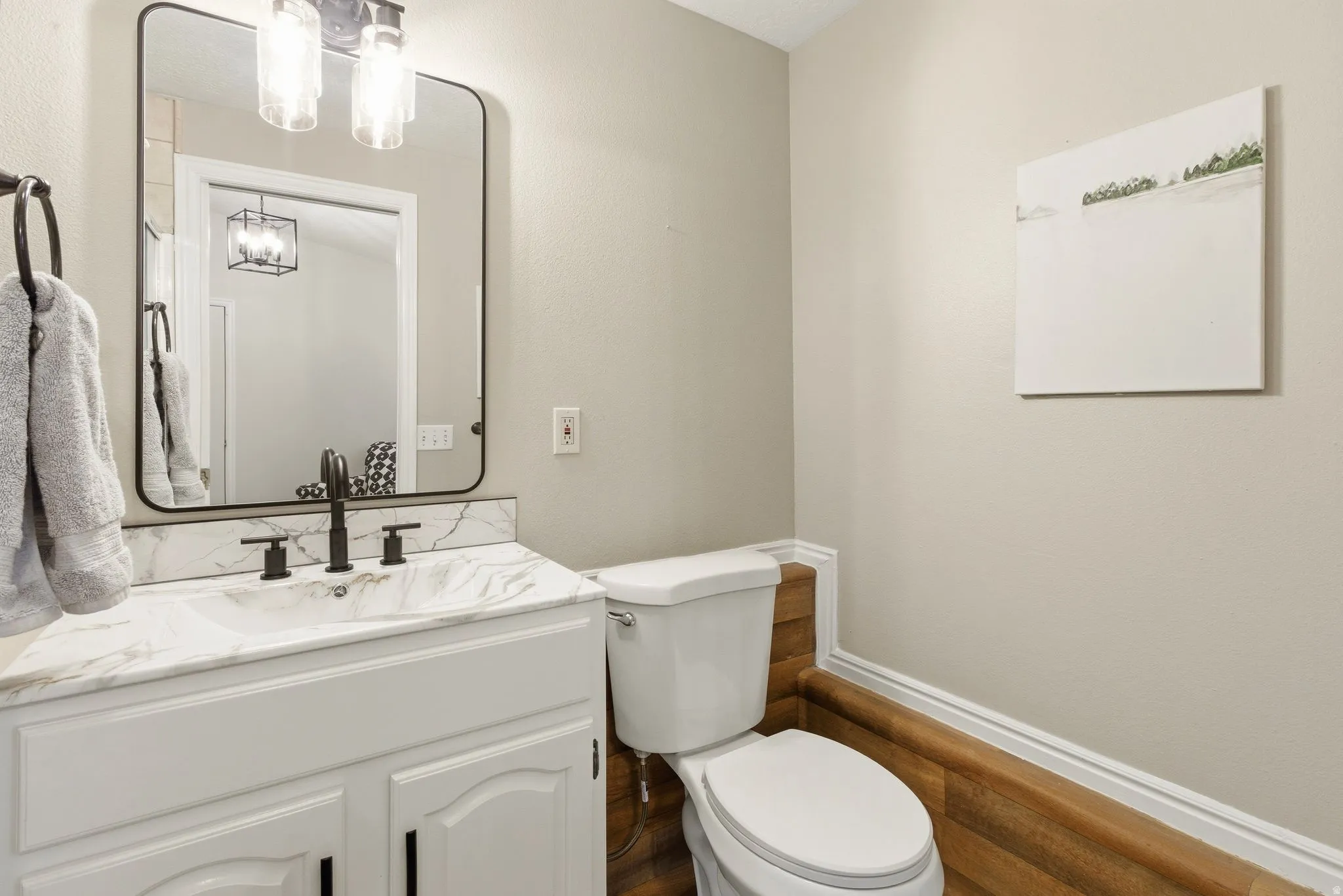 Bathroom featuring toilet and vanity