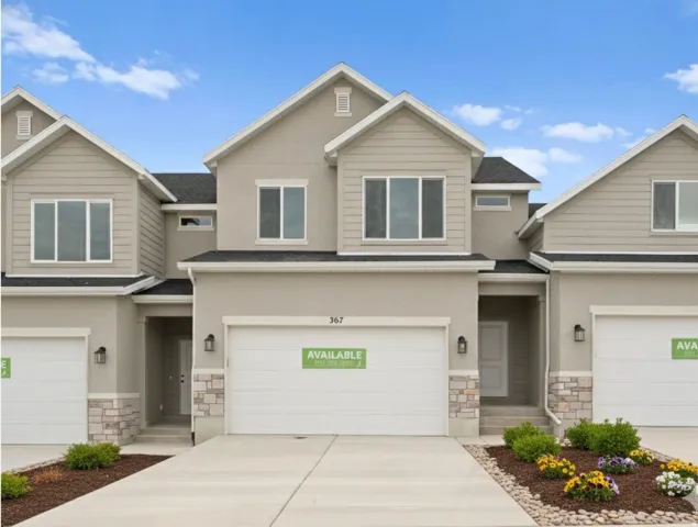 Craftsman-style house with stone siding, a shingled roof, concrete driveway, a garage, and stucco siding