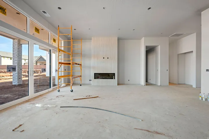 Unfurnished living room with a large fireplace