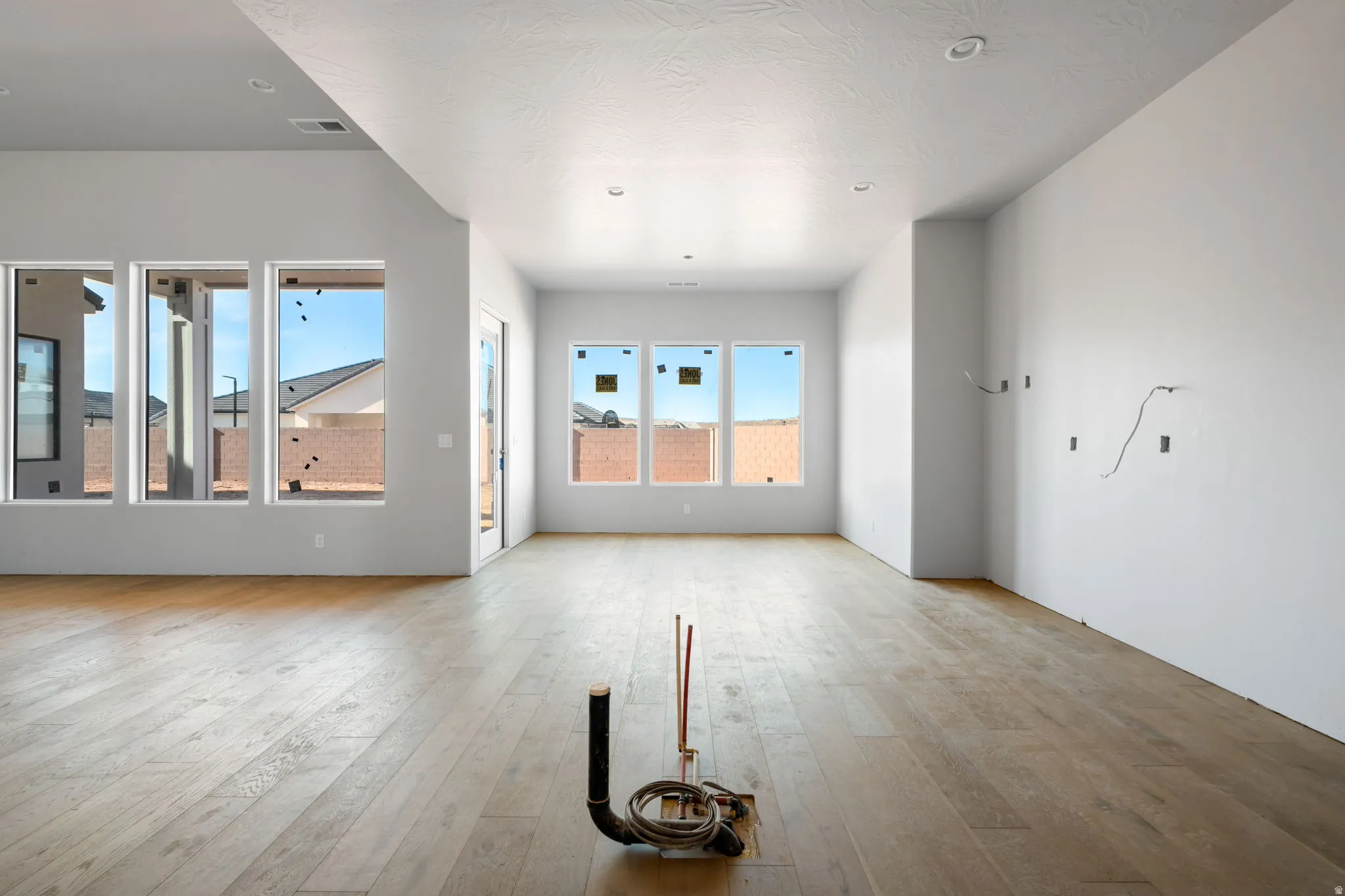 Unfurnished living room with light wood-type flooring