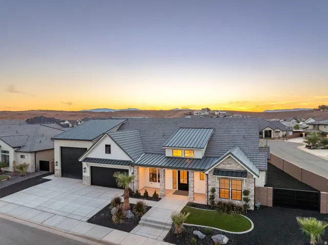 Modern exterior with stone accents and dark trim