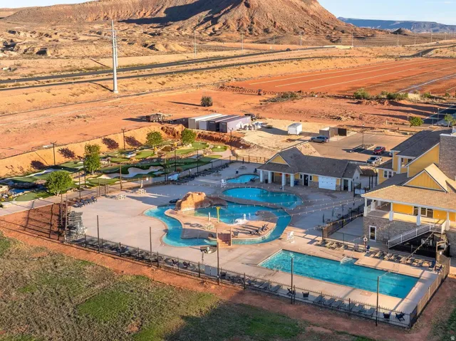 Resort-style amenities featuring multiple swimming pools, a lazy river, and an integrated splash pad