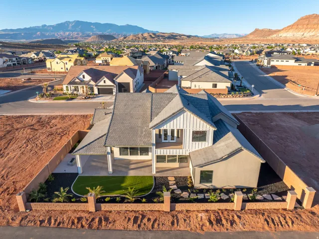 Aerial view of residential area with a mountain backdrop