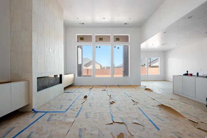 Unfurnished living room with a large fireplace