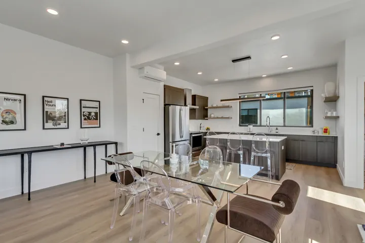 Dining area featuring light wood-style floors, recessed lighting, and a mini split for heating / cooling