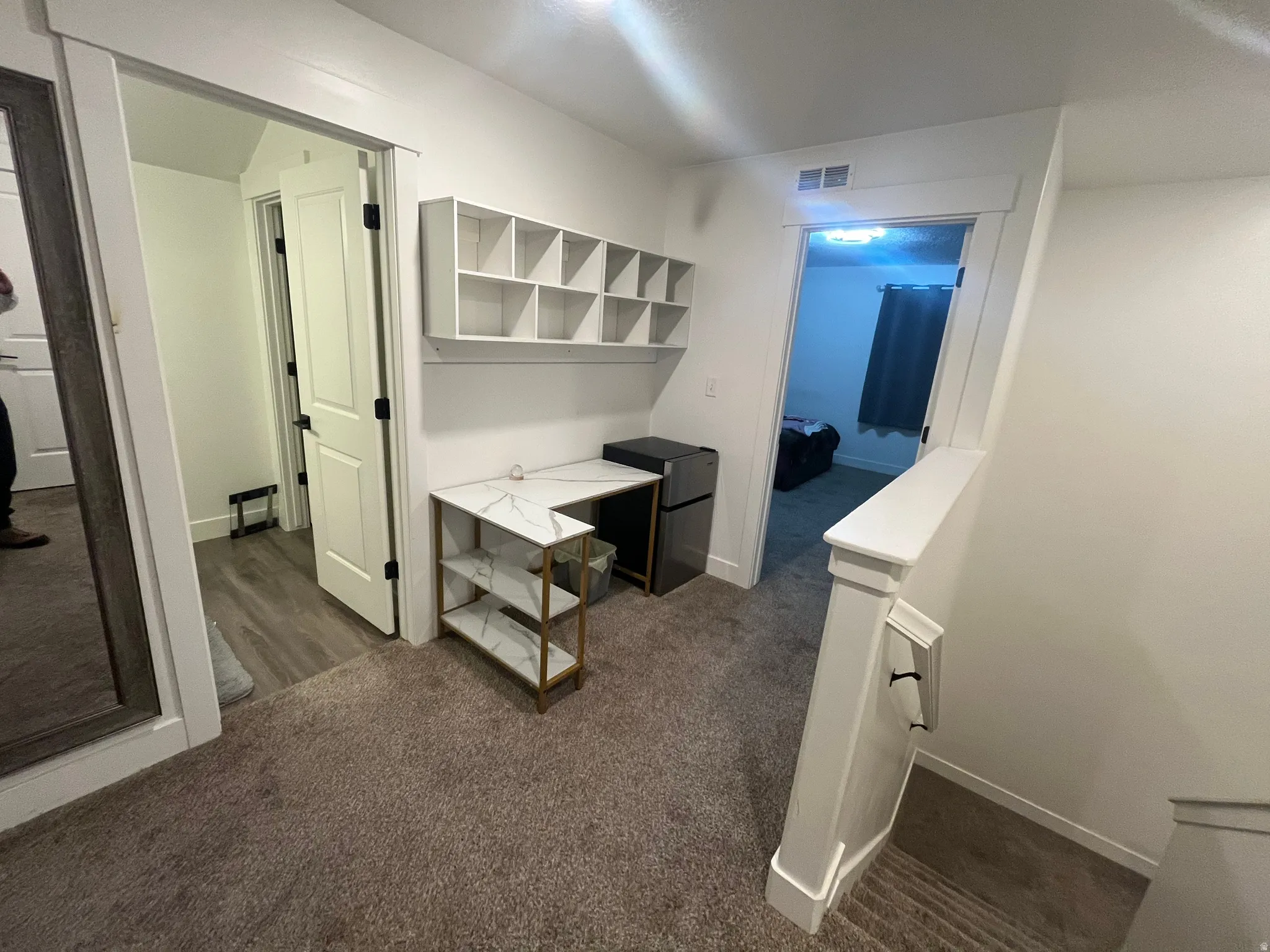 Hallway at top of stirs on upper level