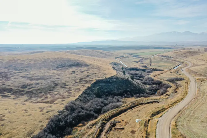 Aerial overview of property's location featuring mountains and rural landscape