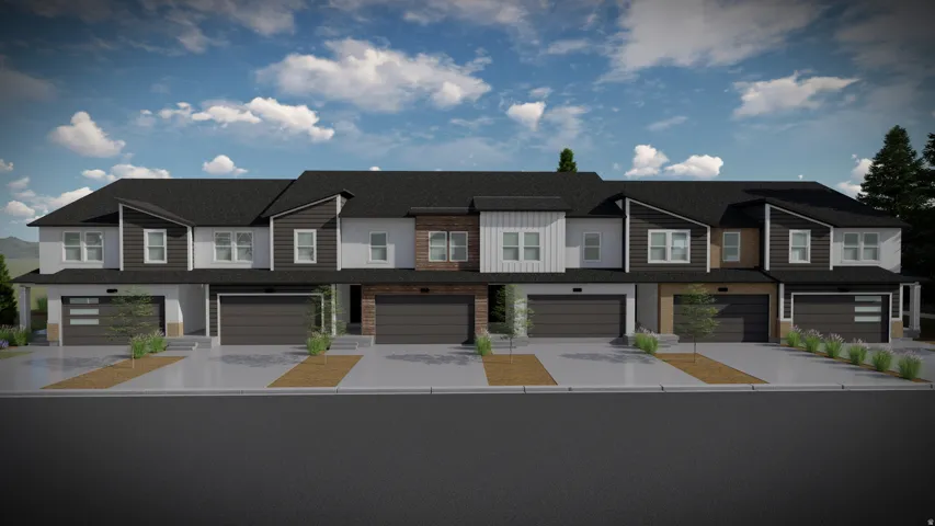 View of front facade featuring concrete driveway, an attached garage, and roof with shingles