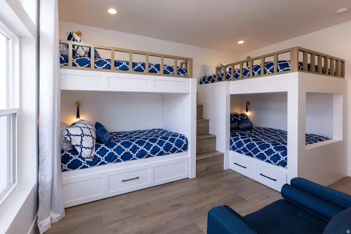 Bedroom featuring wood finished floors and recessed lighting