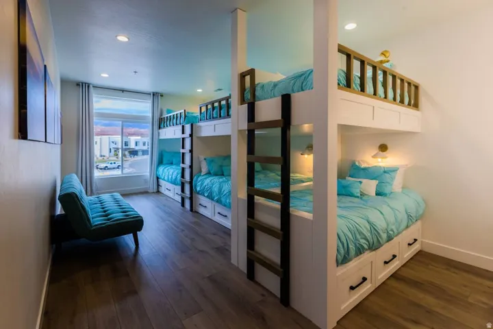 Bedroom featuring dark wood finished floors and recessed lighting