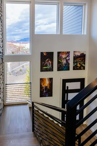 Stairway with wood finished floors and a mountain view