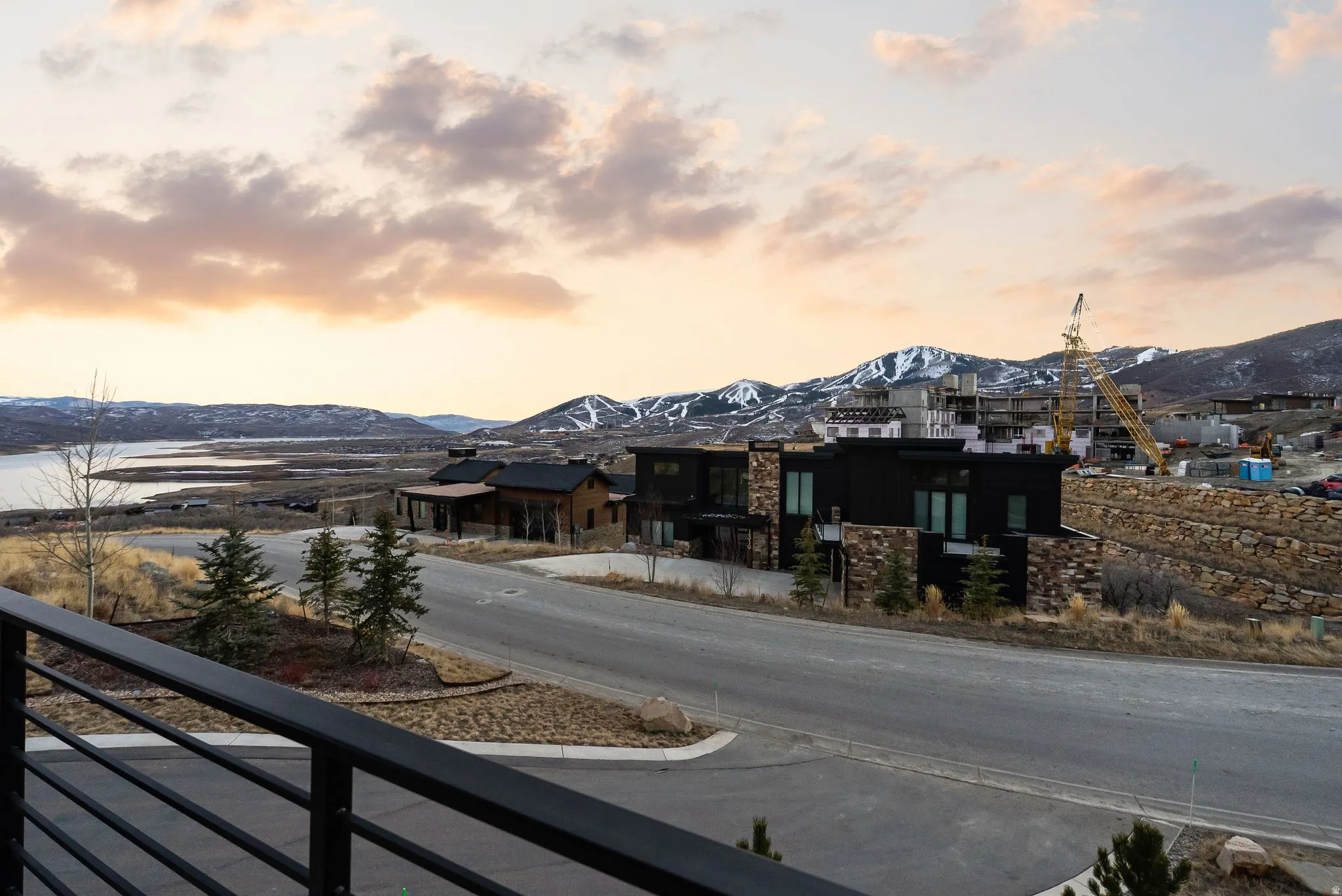 View of asphalt street featuring a mountain view