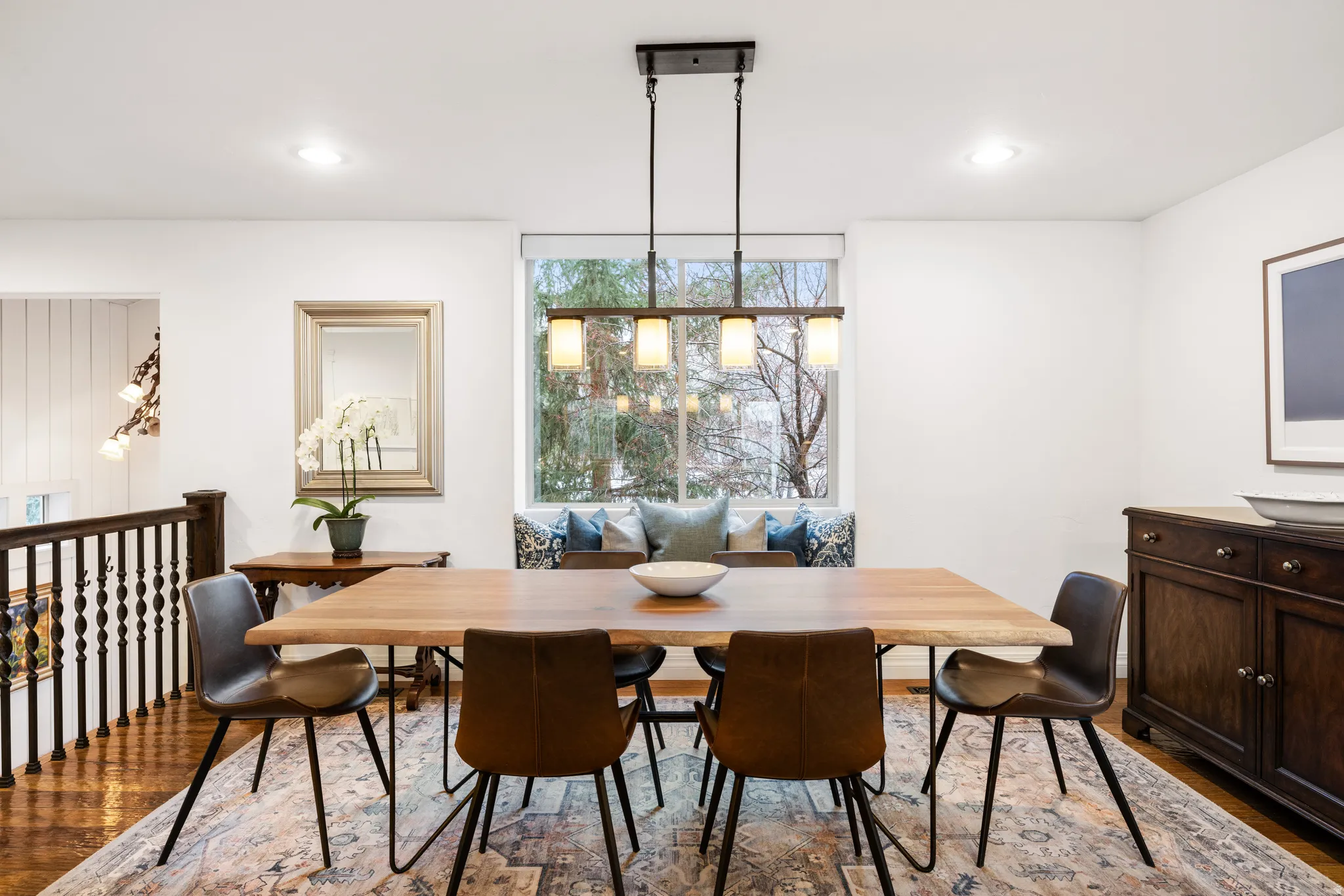 Dining room featuring dark wood-type flooring and recessed lighting