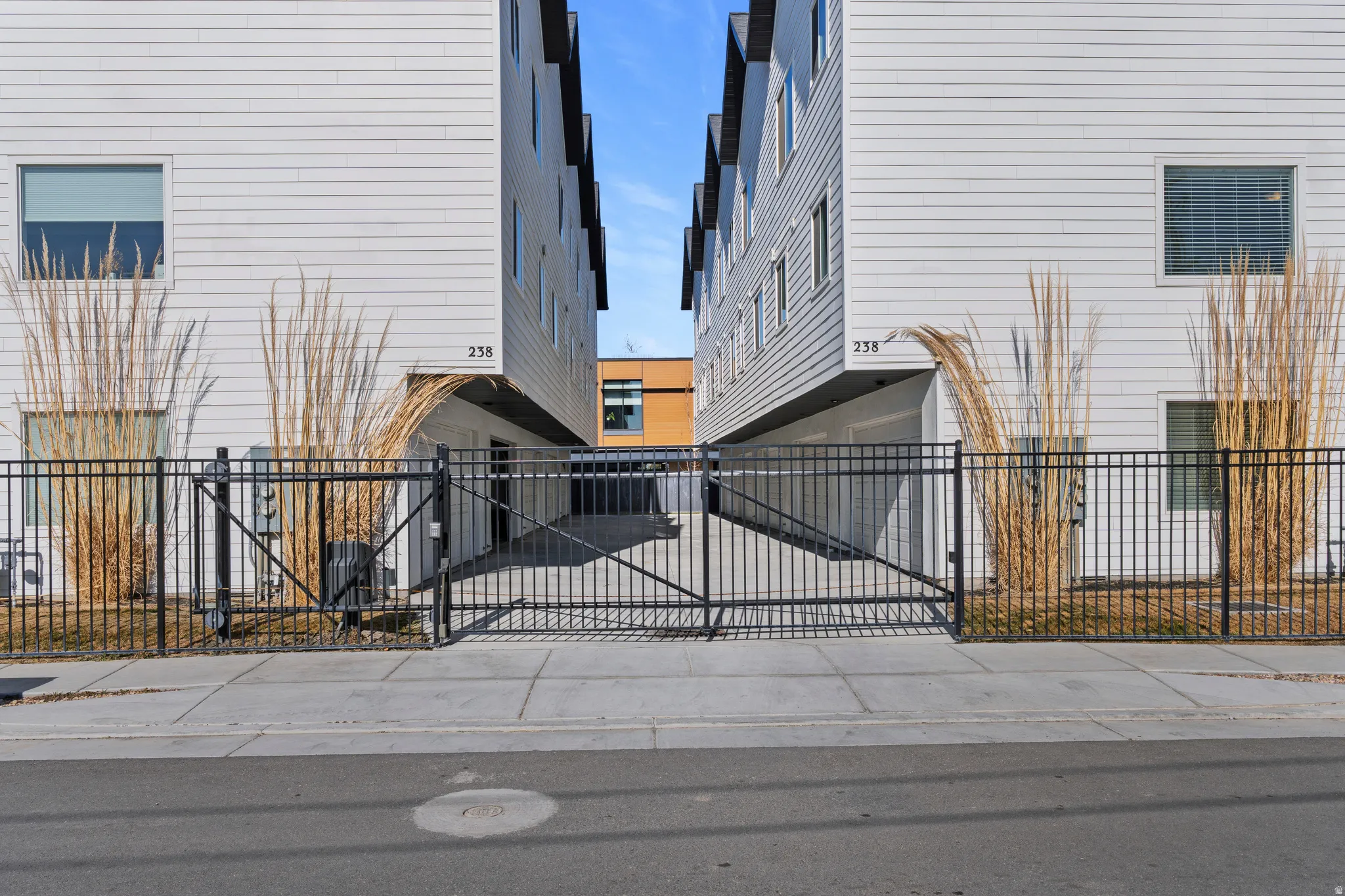 Gate featuring a fenced front yard