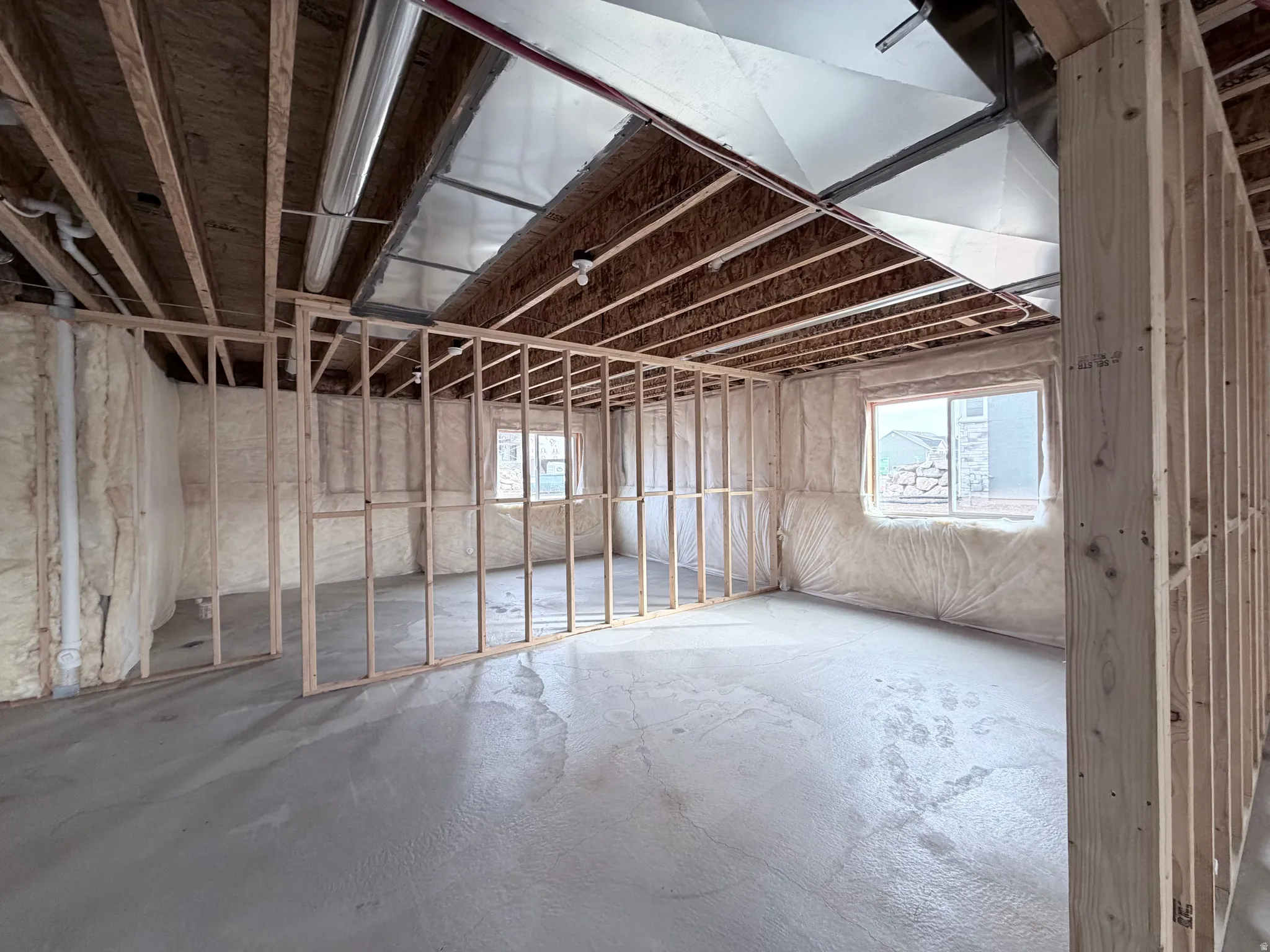 Below grade area featuring plenty of natural light